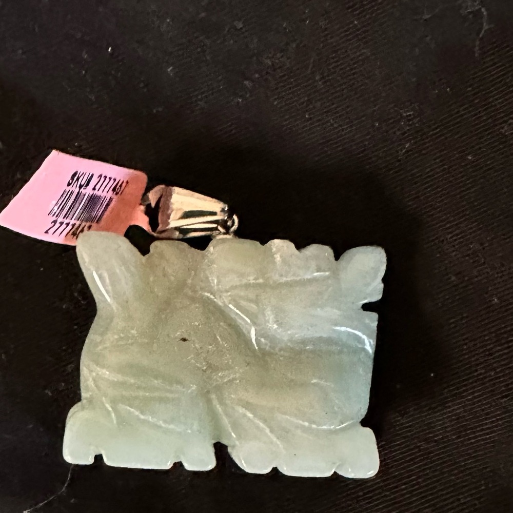 Chinese Light Green Jade Lion Pendant with intricate carving - Size OS